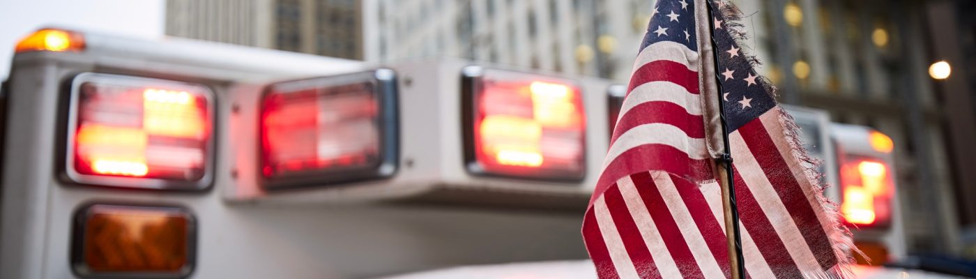 American flag on ambulance car
