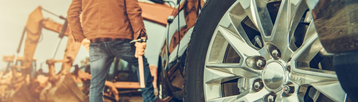 Construction Site Equipment and the Business Owner Next to His Truck