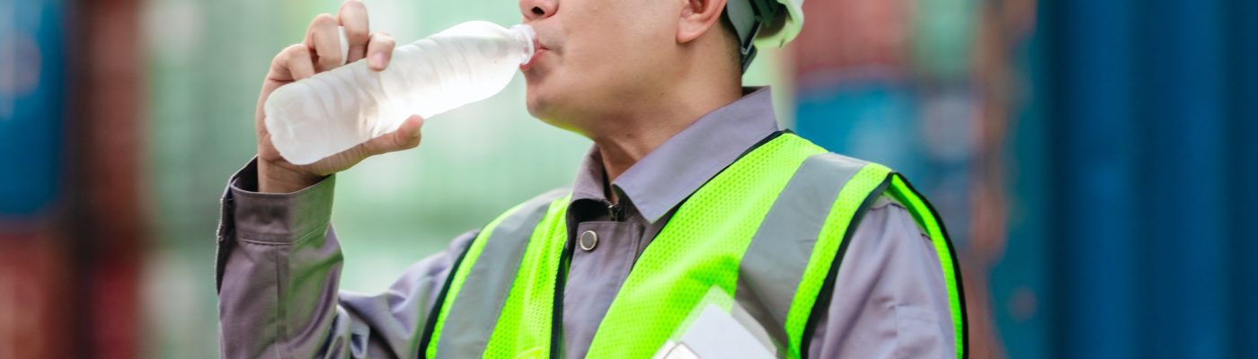 Container Worker Hydrating on the Job