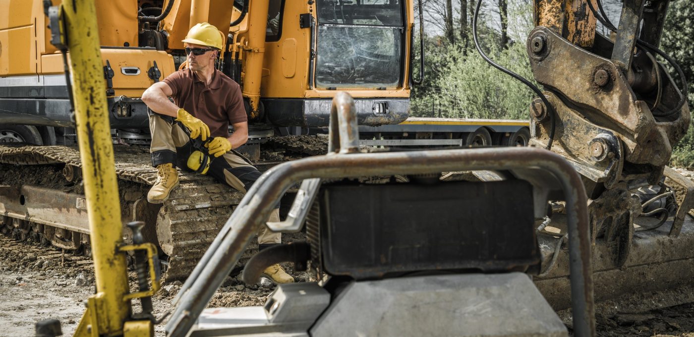 Heavy Duty Excavator Machine Operator on a Break