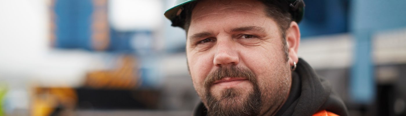 Portrait of engineer at wind farm